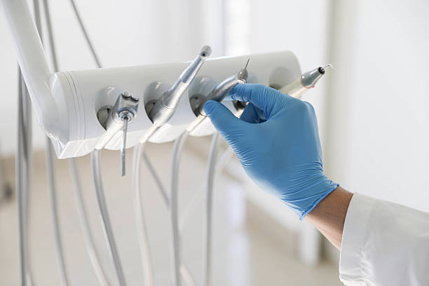 Professional Tooth Extraction technician working in Canadian County County, OK